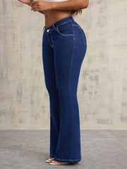 Dark wash denim flare jeans with contrast stitching and a sculpted fit.