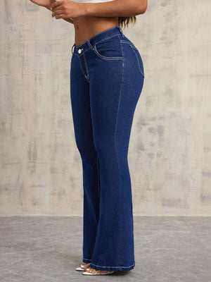Dark wash denim flare jeans with contrast stitching and a sculpted fit.
