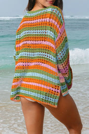 Striped crochet beach cover-up with open knit pattern and side slits.