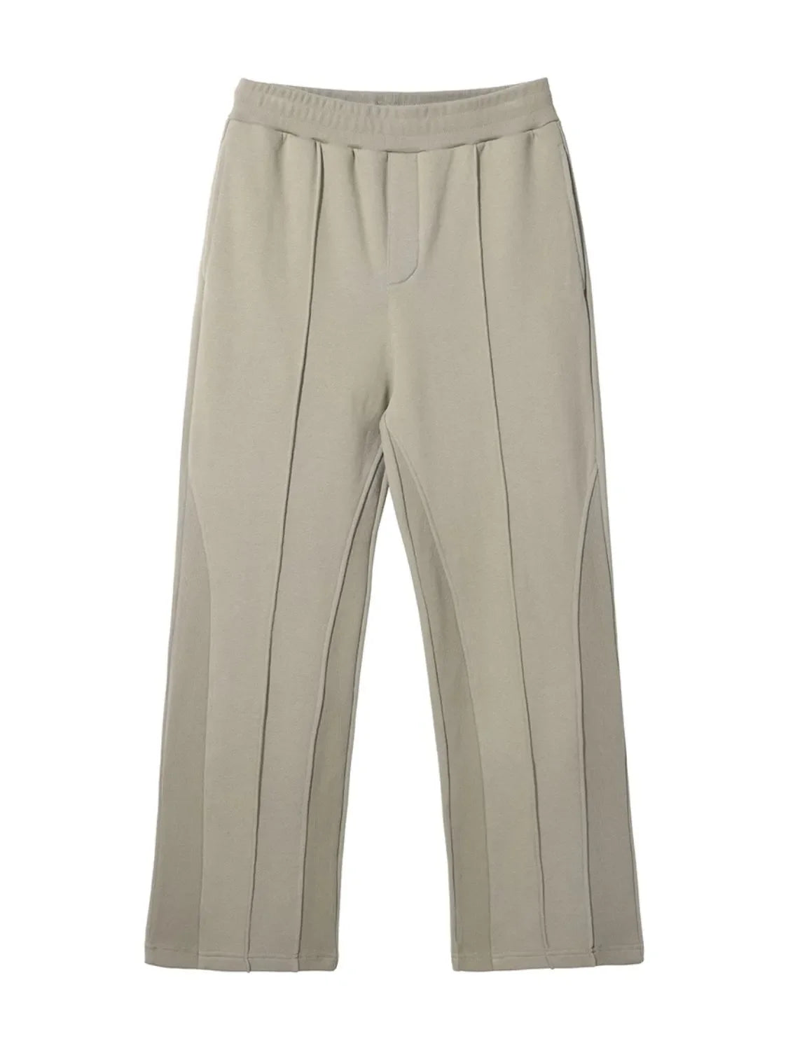 Beige lounge trousers with vertical seam details and a wide leg.