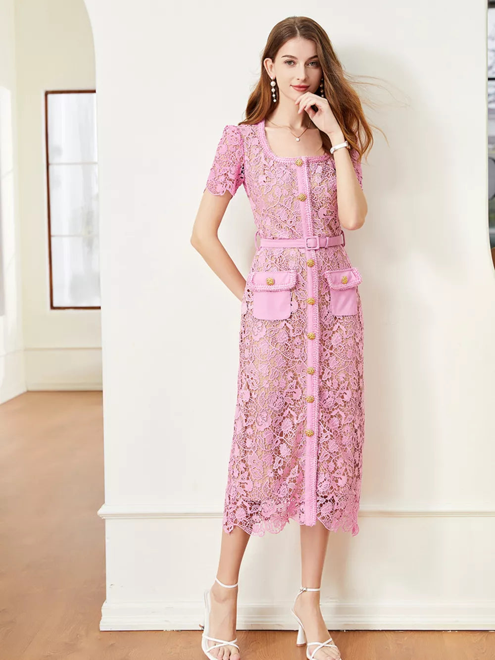 Pink lace midi dress with square neck, short sleeves, button front, belt, and patch pockets.
