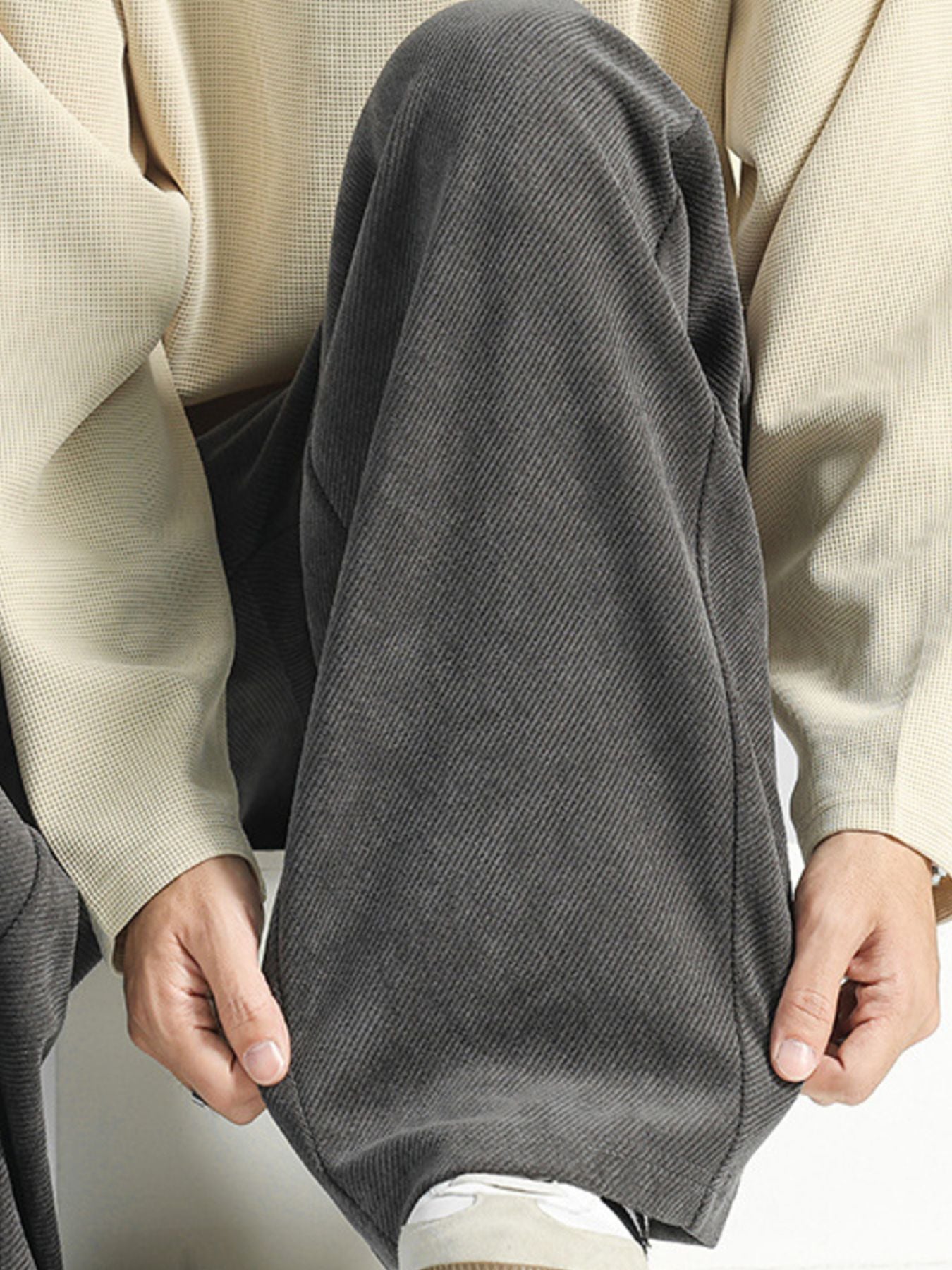 Men's dark gray loose fit sweatpants with pockets, textured fabric