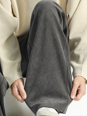 Men's dark gray loose fit sweatpants with pockets, textured fabric
