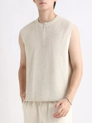 Textured knit quarter-zip men's tank in apricot with a waffle pattern.
