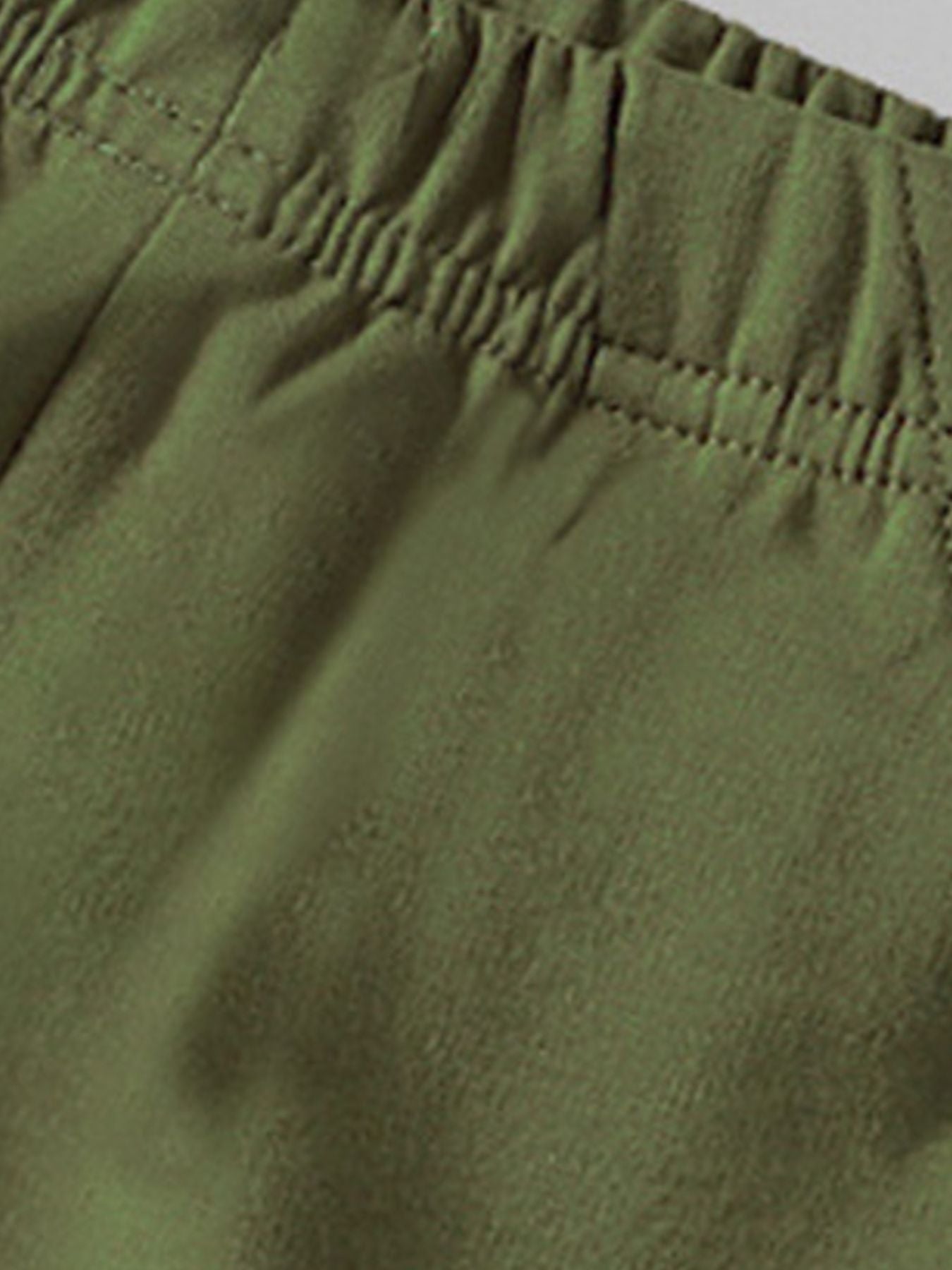 Toddler green cotton pants with elastic waistband detail