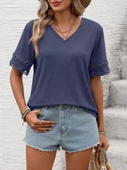 Navy blue V-neck t-shirt with lace trim on sleeves