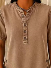 Denim-inspired khaki short sleeve button blouse with band collar.