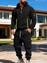 Black half-zip hoodie and cargo pants set with neon yellow accents.