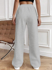 Light gray pleated palazzo drawstring trousers with a wide leg
