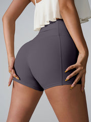 Charcoal active shorts with sculpted pocket detail and high waist
