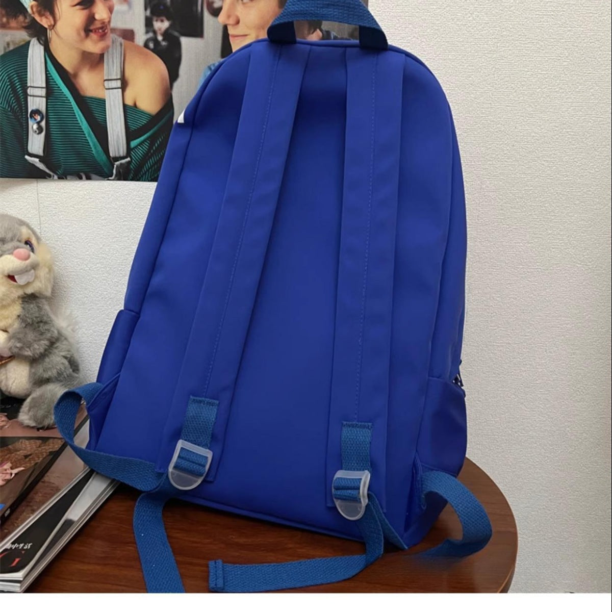 Klein Blue nylon medium backpack with adjustable straps and utility pocket detail.
