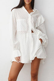 White textured ruffle trim shirt set with collared neckline and button front.