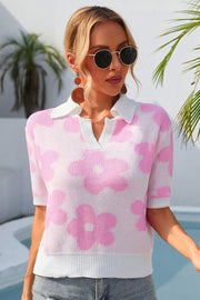 Pink floral knit polo with contrast collar and short sleeves