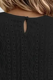 Black eyelet embroidered blouse with lace yoke detail and keyhole back.