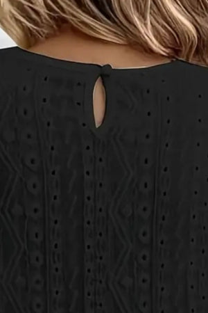 Black eyelet embroidered blouse with lace yoke detail and keyhole back.