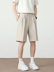 Men's cream chino shorts with pleated detail and loose fit