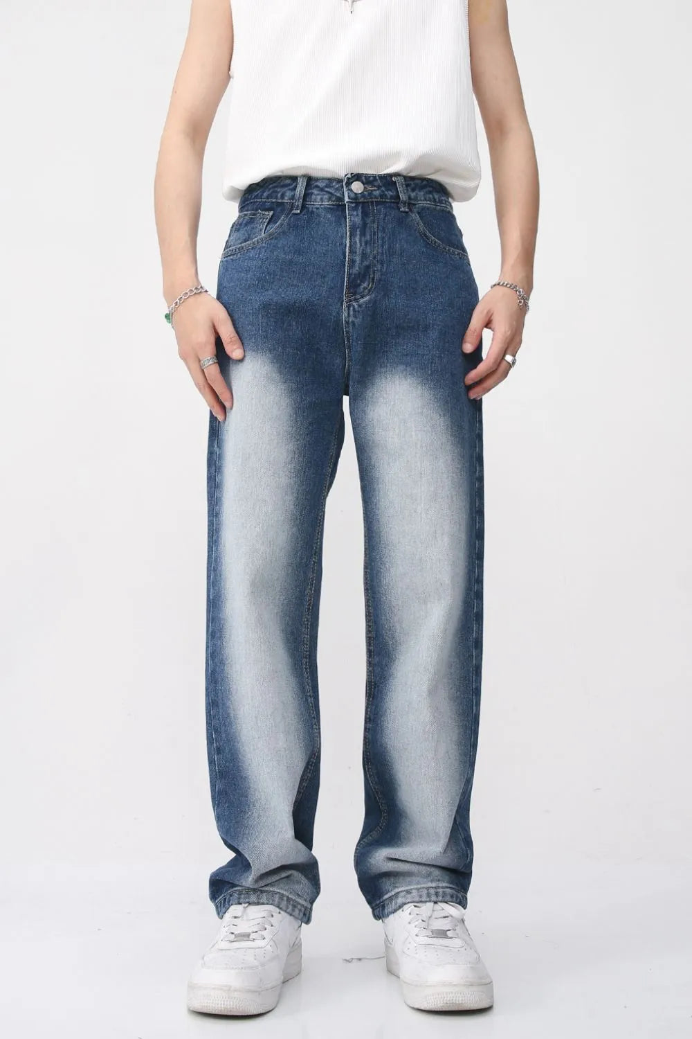 Baggy jeans in medium faded wash denim with a relaxed fit.