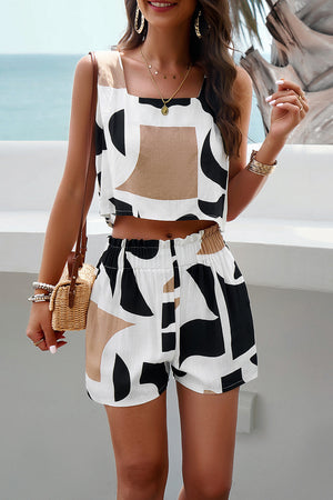 Abstract geo print crop top and shorts set in white, black, and tan viscose.