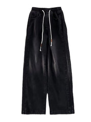 Black wide-leg drawstring jeans with a relaxed fit and denim material.