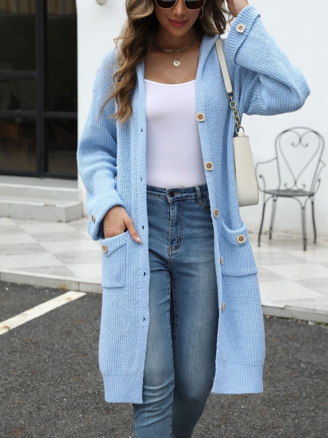 Light blue longline button-down knit cardigan with hood and pockets