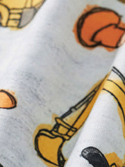 Toddler tee and shorts set with all-over construction vehicle print on white fabric.