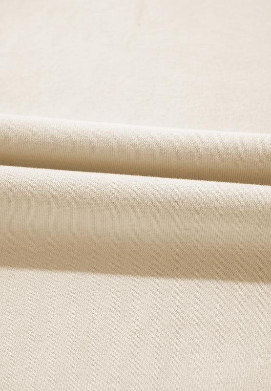 Beige wide-leg drawstring lounge trousers in soft knit fabric