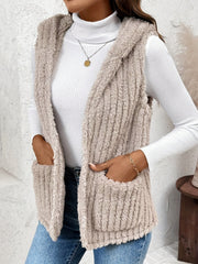 Textured teddy hooded pocket vest in Dust Storm with vertical ribbing and cozy fleece lining.