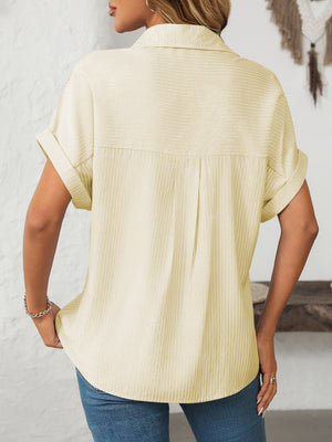 Pastel yellow striped button-down shirt with cuffed short sleeves and a relaxed fit.