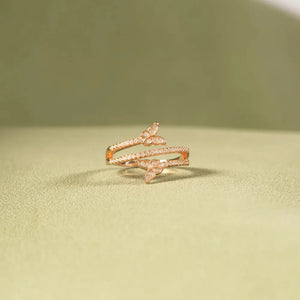Gold bypass ring with pavé butterfly details, 18K gold-plated.