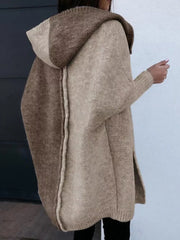 Two-tone hooded knit cardigan in camel and brown acrylic with a split hem.