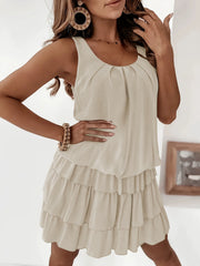Ruffled tiered mini dress in khaki with a scoop neck and sleeveless design.