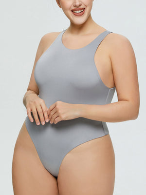 Light gray tank bodysuit with high-cut legs and racerback detail