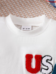 White cotton baby tee with red, white, and blue chenille US letters.