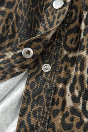 Denim dress with leopard print, snap button closure detail.