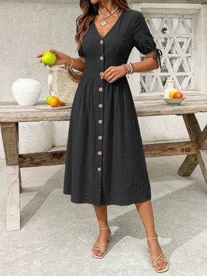 Black button-down midi dress with tie detail sleeves and a-line skirt