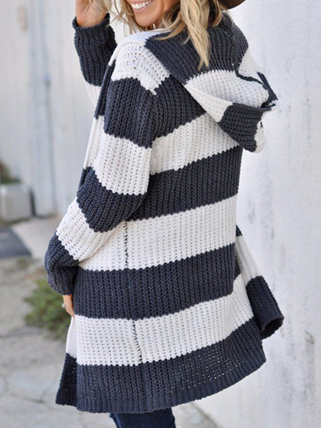 Chunky stripe hooded knit cardigan in white and grey, with a relaxed fit and open front.