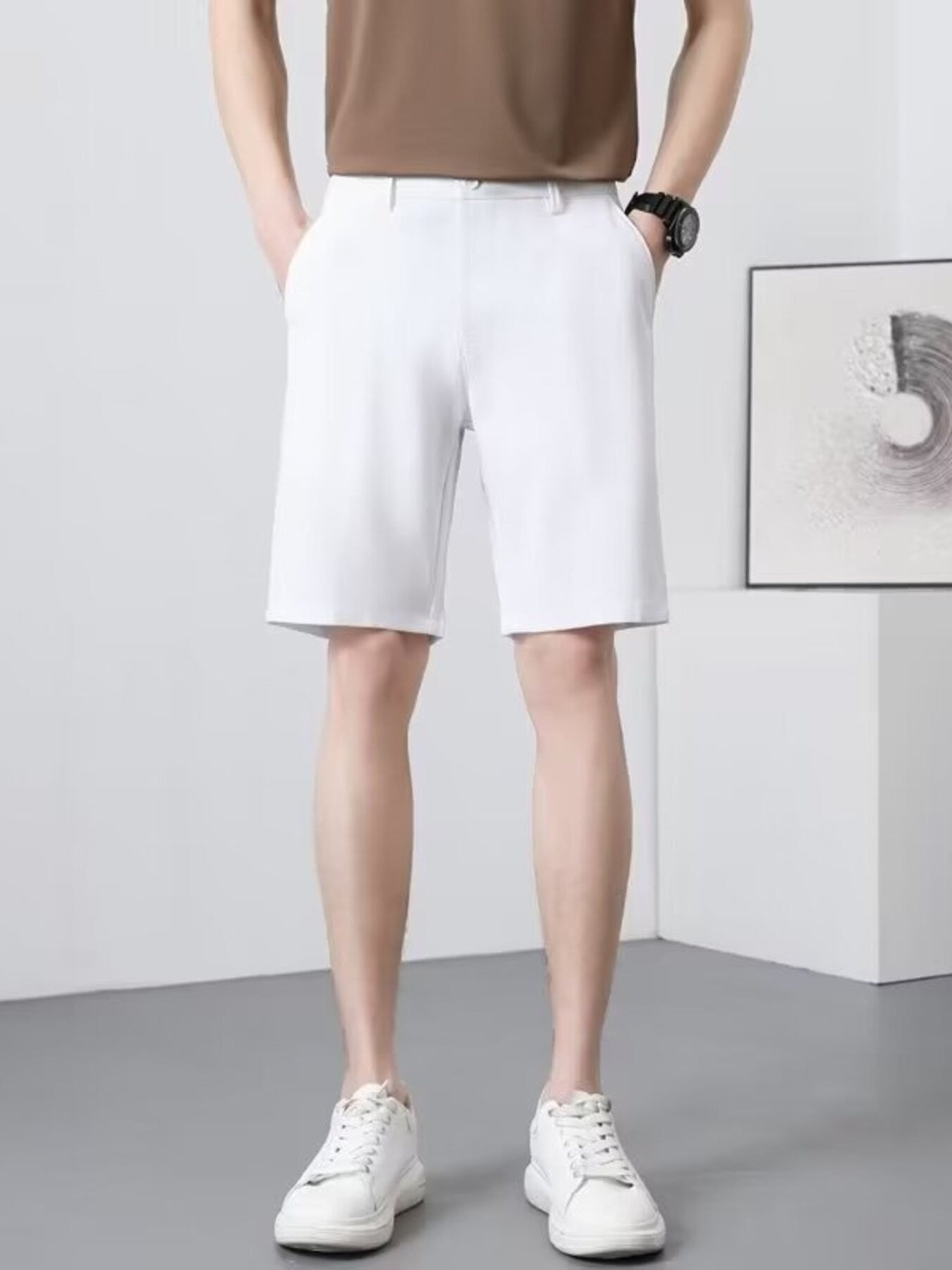 Men's white chino shorts with a casual, lightweight fit.