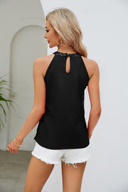 Black halterneck tank top with sequin trim and keyhole back detail