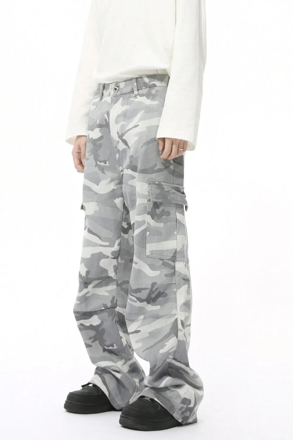 Gray camouflage cargo pants with multiple pockets and a relaxed fit.