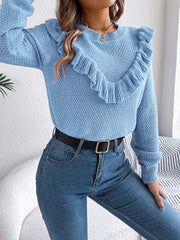 Light blue textured knit sweater with ruffle yoke detail and crew neck.