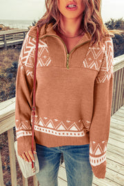 Geometric knit zip-neck pullover sweater in rust with white pattern and quarter zip.