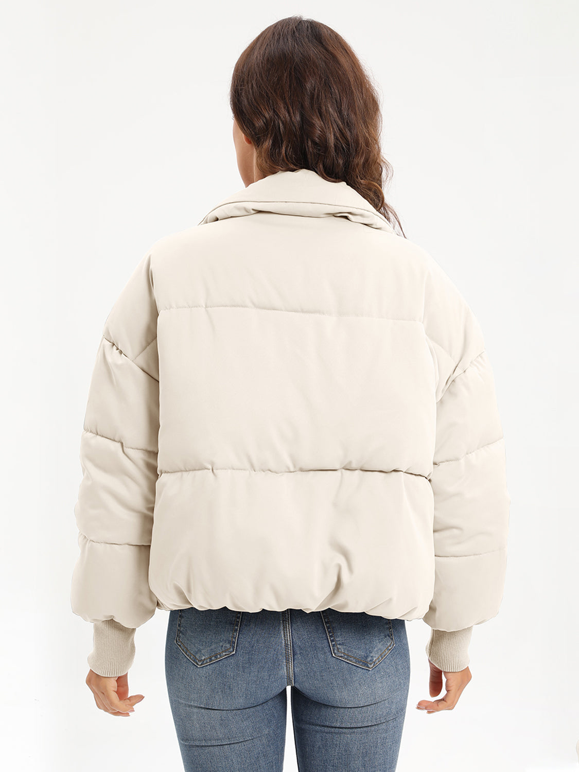 Cream padded bomber jacket with ribbed cuffs and collar, shown from the back.