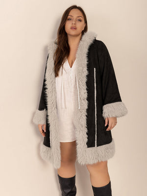 Black hooded duster coat with faux shearling trim and cuffs.