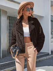 Faux fur biker jacket in chocolate brown with a relaxed fit and lapel collar.