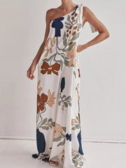 Elegant one-shoulder maxi dress with a floral print and tie detail.