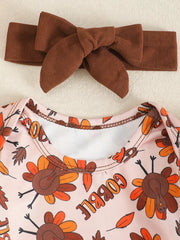 Baby bodysuit with Thanksgiving turkey print and brown corduroy bow headband.