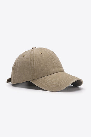 Washed cotton baseball cap in Khaki with adjustable strap and stitched details.