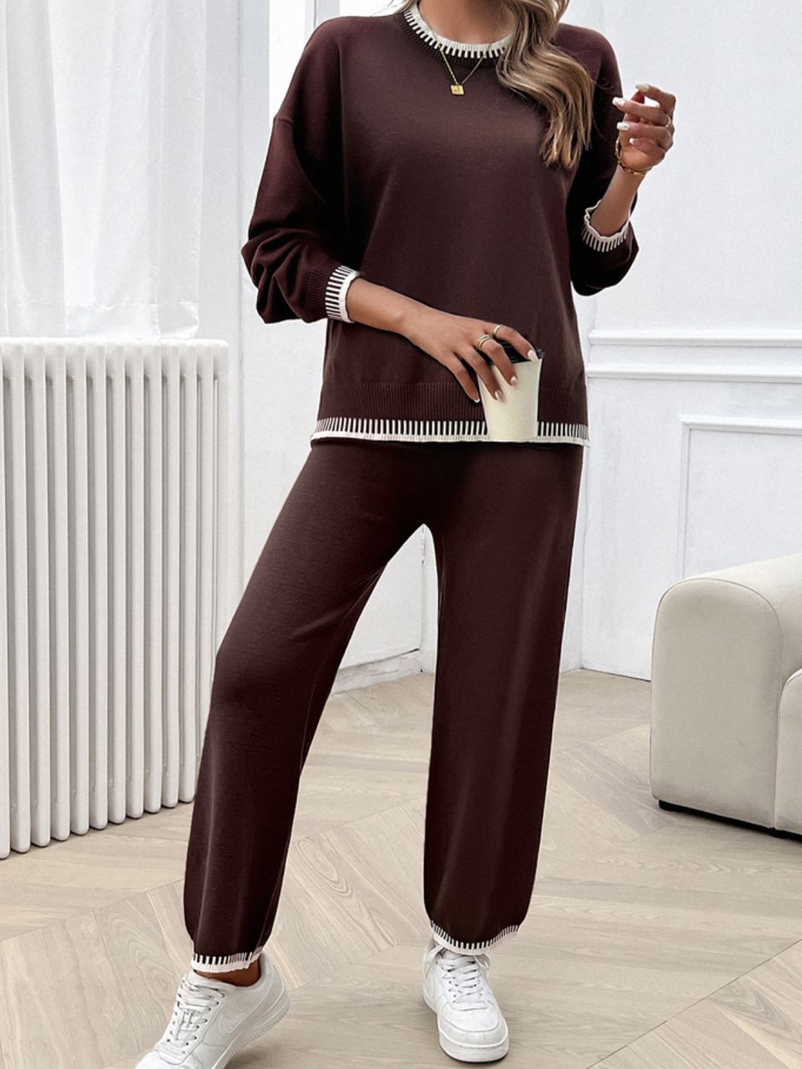 Brown knit lounge set with ribbed trim on neckline, cuffs, and hem.