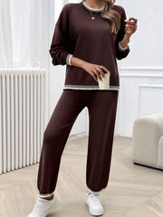 Brown knit lounge set with ribbed trim on neckline, cuffs, and hem.