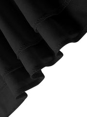 Black ruffled mini dress with textured fabric and asymmetrical hem detail.
